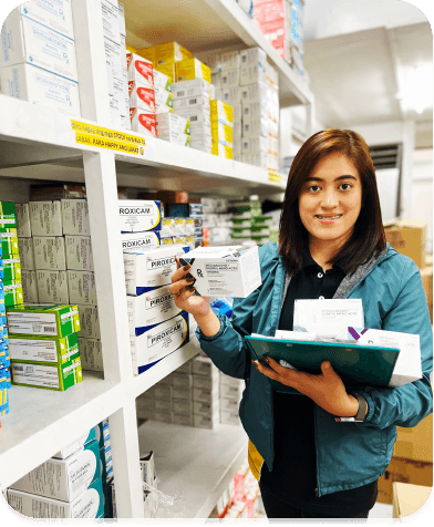 Pharmacist from Pharma Depot holding Medicine Box