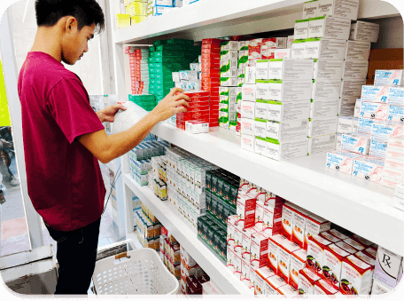 Pharmacist from Pharma Depot checking pharmacy store inventory